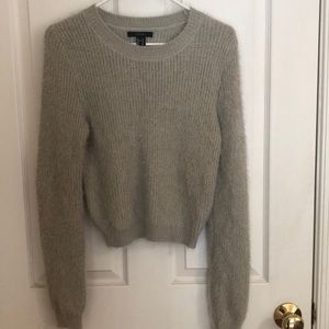 Soft and fuzzy, slightly cropped grey sweater - perfect with jeans or a skirt!
